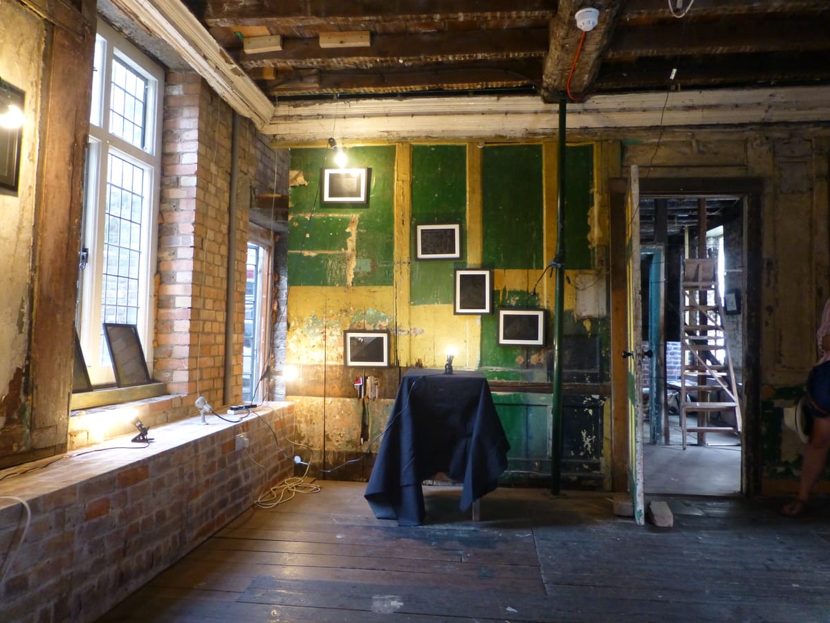 Installation view of the group exhibition Addressing the Void at House of Annetta, Dhaka, artworks installed in a domestic room (view 2 of 3)